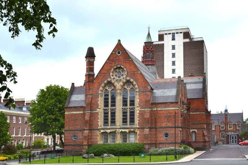 an ancient building with a fake lawn